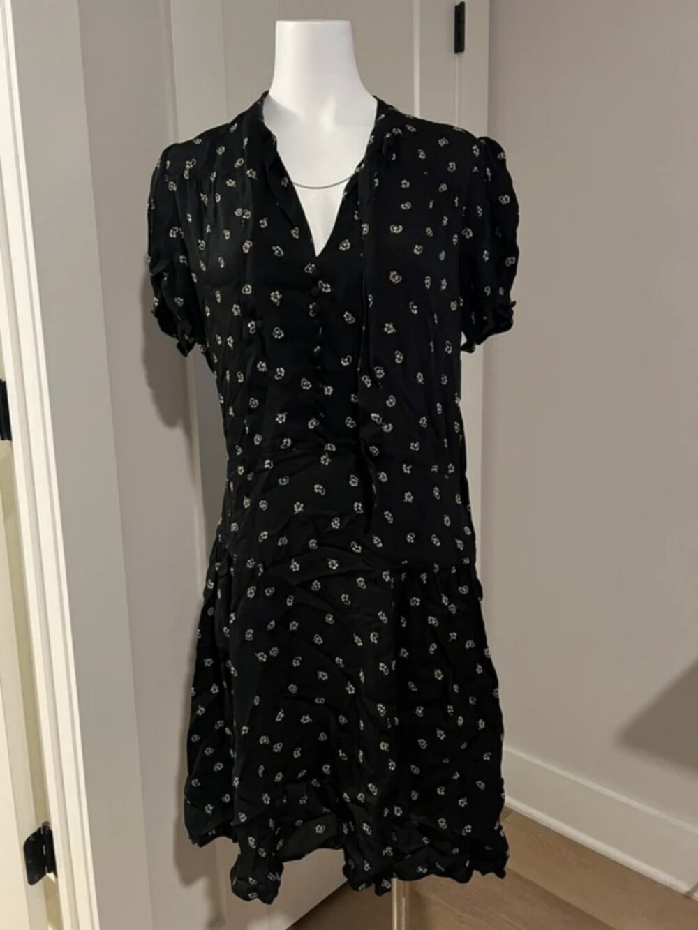 Black mini dress with white floral print